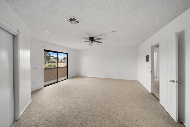 1510 W Newgrove St, Lancaster, CA 93534 - spare room featuring carpet floors, a ceiling fan, and a textured ceiling