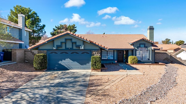 view of front of home with a garage