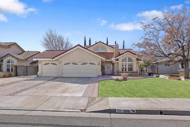 mediterranean / spanish-style house with a garage, a front yard, fence, and a tiled roof