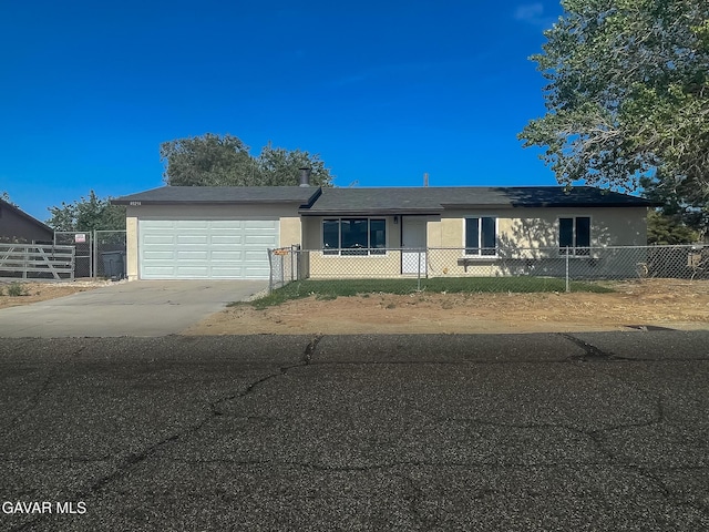 40294 Fieldspring St, Palmdale, CA 93591 - ranch-style house featuring stucco siding, an attached garage, and driveway