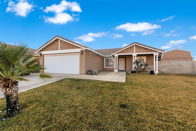 single story home featuring a garage and a front yard