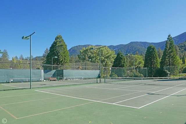 view of sport court featuring a mountain view