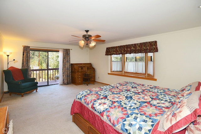 carpeted bedroom with access to outside, ceiling fan, and ornamental molding