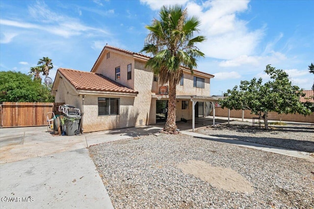 37623 E 49th St, Palmdale, CA 93552 - view of front of house featuring stucco siding, a patio area, and a tiled roof