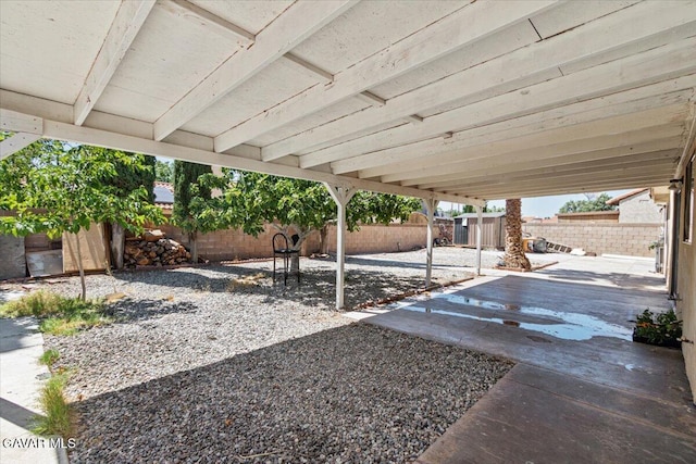 37623 E 49th St, Palmdale, CA 93552 - fenced backyard featuring a patio area and a storage unit