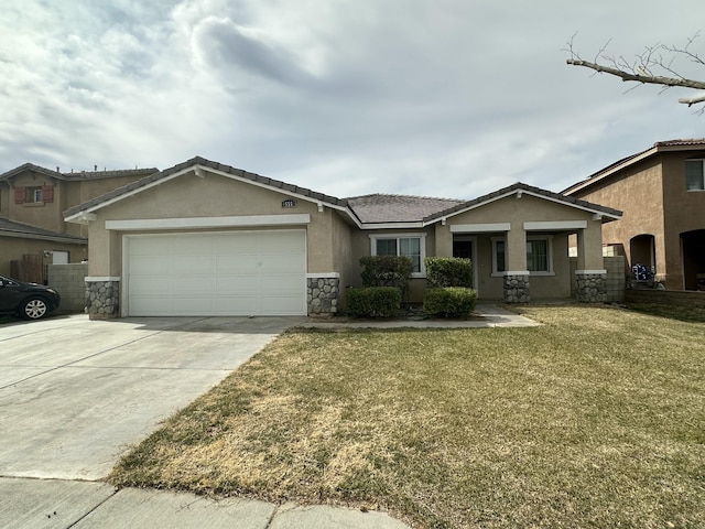 45559 Robinson Dr, Lancaster, CA 93535 - view of front of property with stone siding, stucco siding, a garage, driveway, and a front yard