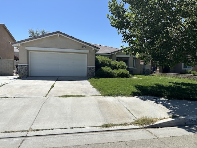 45559 Robinson Dr, Lancaster, CA 93535 - ranch-style home featuring stucco siding, concrete driveway, an attached garage, and a front lawn