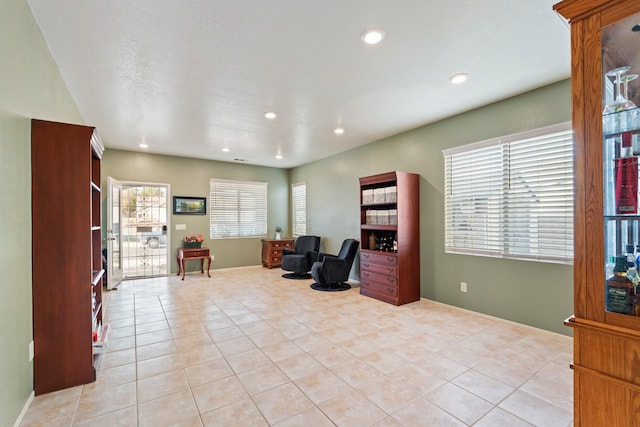 sitting room with light tile patterned floors