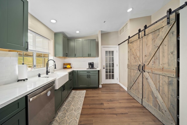 32722 Wagon Wheel Rd, Agua Dulce, CA 91390 - kitchen featuring dishwasher, green cabinetry, a barn door, tasteful backsplash, and recessed lighting