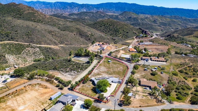 32722 Wagon Wheel Rd, Agua Dulce, CA 91390 - aerial overview of property's location featuring property parcel outlined and a mountain backdrop
