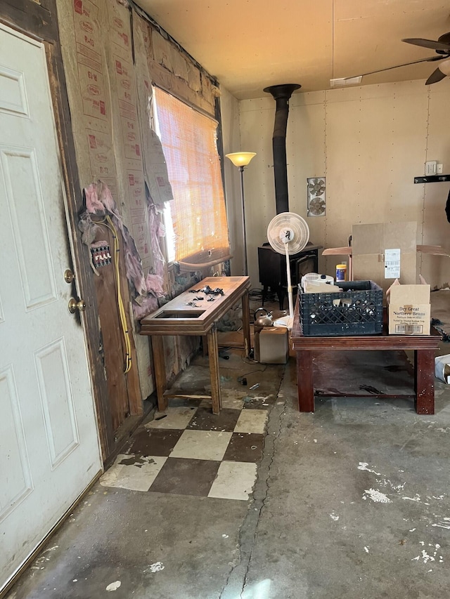 19507 E E Avenue Q, Palmdale, CA 93591 - miscellaneous room with ceiling fan and concrete floors