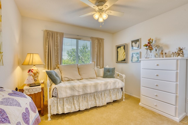 3216 Janine Ave, Rosamond, CA 93560 - bedroom with light carpet, baseboards, and ceiling fan