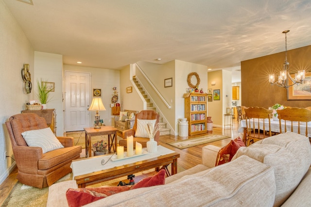 3216 Janine Ave, Rosamond, CA 93560 - living room with light wood-style floors, a chandelier, stairs, baseboards, and recessed lighting