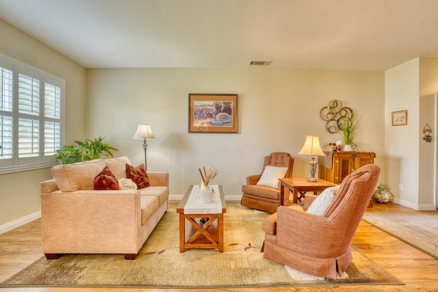 3216 Janine Ave, Rosamond, CA 93560 - living area featuring wood finished floors and baseboards