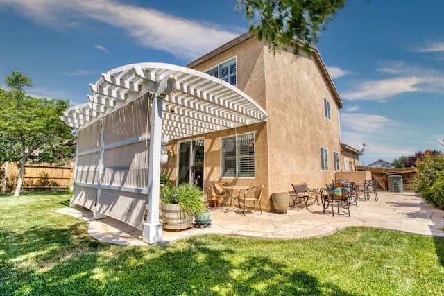 3216 Janine Ave, Rosamond, CA 93560 - back of house featuring a pergola, a patio, and stucco siding