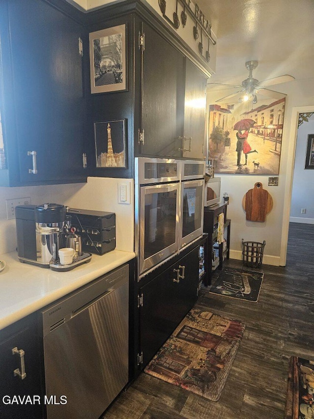 1283 W Lancaster Blvd, Lancaster, CA 93534 - kitchen featuring stainless steel dishwasher, a ceiling fan, dark wood finished floors, and light countertops