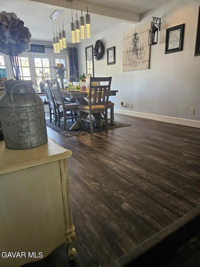 1283 W Lancaster Blvd, Lancaster, CA 93534 - dining area with dark wood finished floors and baseboards