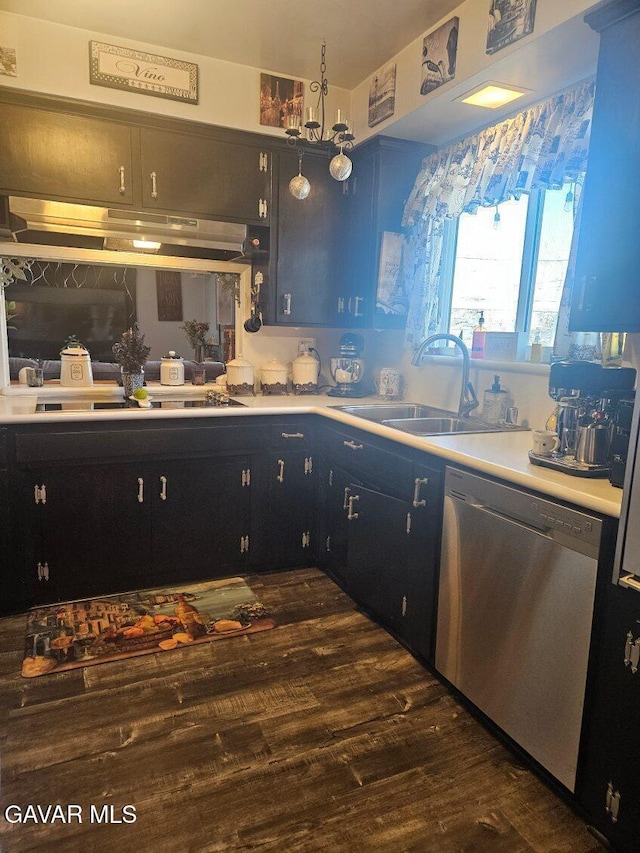 1283 W Lancaster Blvd, Lancaster, CA 93534 - kitchen with dishwasher, light countertops, dark wood-style floors, and a chandelier