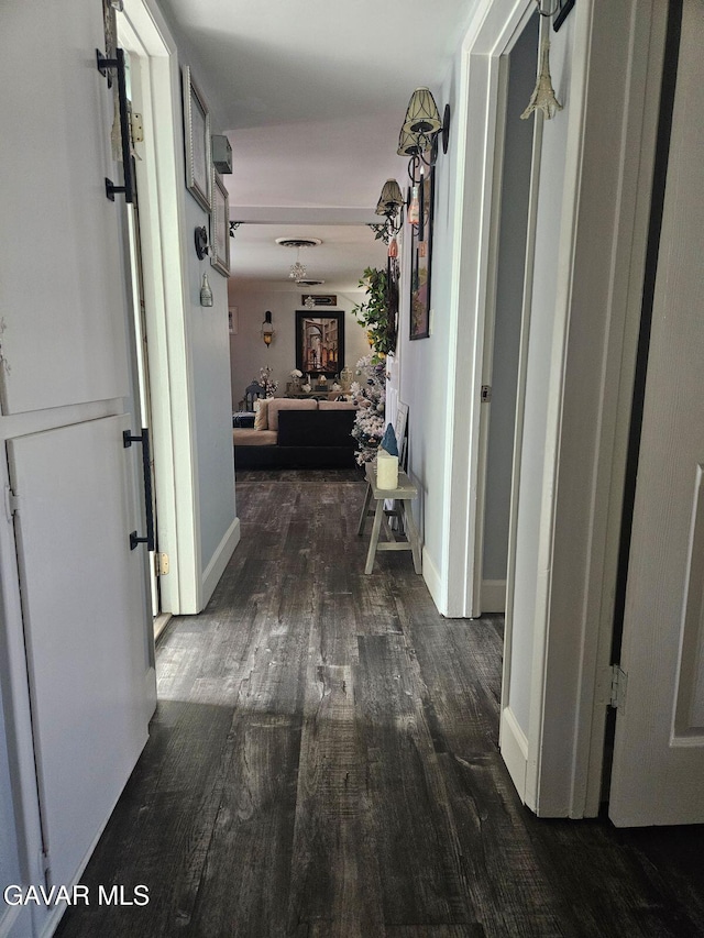 1283 W Lancaster Blvd, Lancaster, CA 93534 - hallway with wood finished floors and baseboards