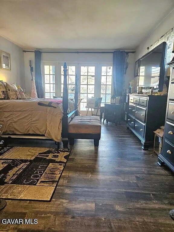 1283 W Lancaster Blvd, Lancaster, CA 93534 - bedroom featuring dark wood-style floors