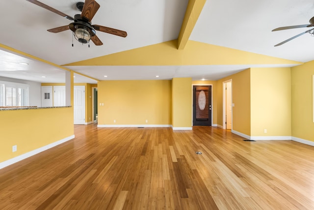 unfurnished living room featuring vaulted ceiling with beams, recessed lighting, a ceiling fan, light wood-type flooring, and baseboards