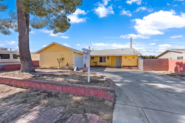 single story home featuring a garage