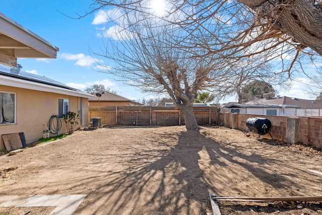 view of yard featuring central AC