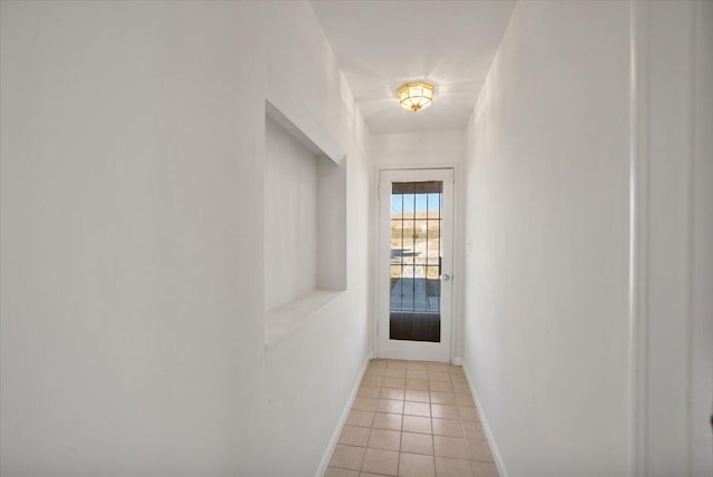 39441 E 140th St, Palmdale, CA 93591 - hallway featuring light tile patterned flooring and baseboards