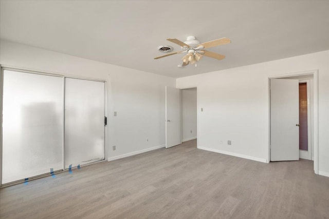 39441 E 140th St, Palmdale, CA 93591 - unfurnished bedroom with light wood finished floors, baseboards, a closet, and ceiling fan
