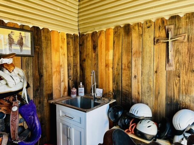 bar with wooden walls and sink