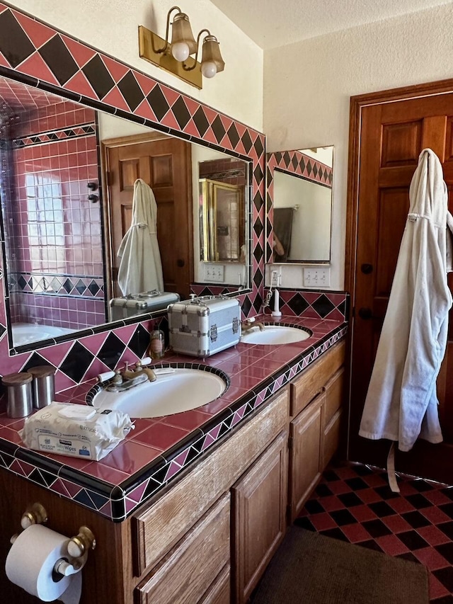 bathroom featuring backsplash and vanity