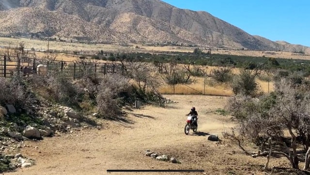 property view of mountains with a rural view