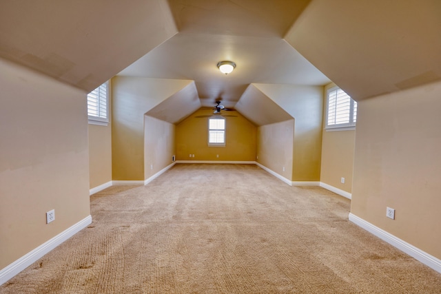 24281 Jacaranda Dr, Tehachapi, CA 93561 - additional living space with lofted ceiling, carpet, and baseboards