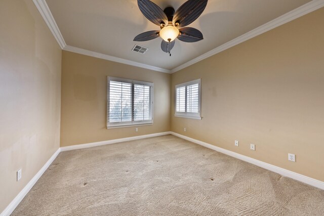 24281 Jacaranda Dr, Tehachapi, CA 93561 - empty room with visible vents, ceiling fan, baseboards, ornamental molding, and light carpet