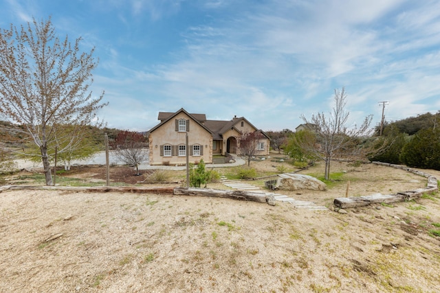 24281 Jacaranda Dr, Tehachapi, CA 93561 - tudor home featuring stucco siding