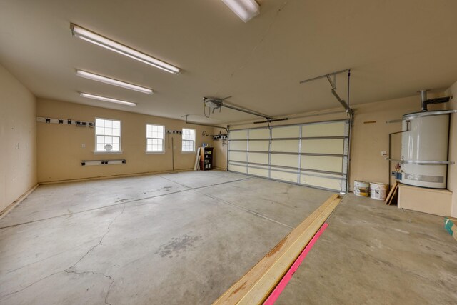 24281 Jacaranda Dr, Tehachapi, CA 93561 - garage featuring strapped water heater