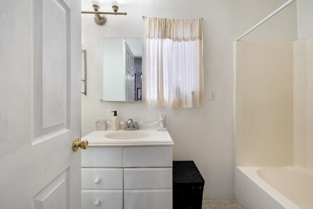 bathroom featuring shower / bathtub combination and vanity