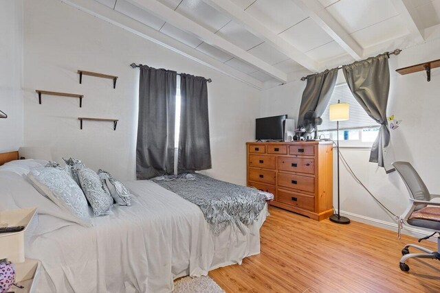 44008 E 3rd St, Lancaster, CA 93535 - bedroom with light wood finished floors, lofted ceiling with beams, and baseboards