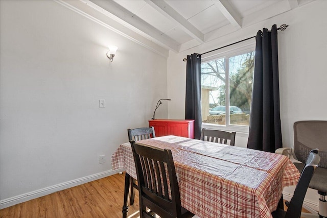 44008 E 3rd St, Lancaster, CA 93535 - dining space with light wood finished floors, lofted ceiling with beams, and baseboards