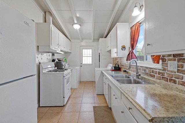 44008 E 3rd St, Lancaster, CA 93535 - kitchen with a sink, washer / clothes dryer, white appliances, tasteful backsplash, and under cabinet range hood