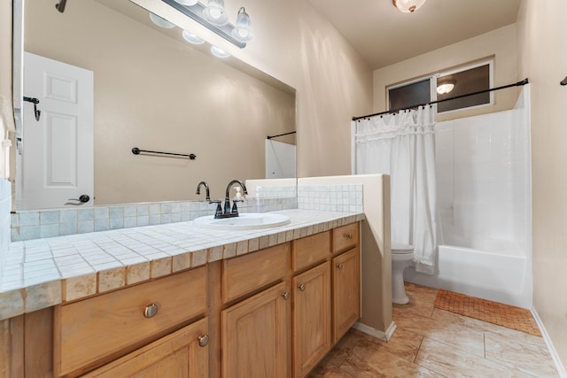 full bathroom with toilet, vanity, and shower / tub combo with curtain