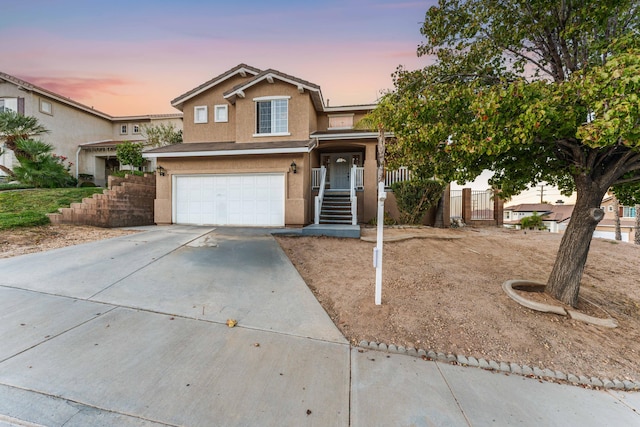 view of front of property with a garage