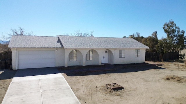 single story home featuring a garage