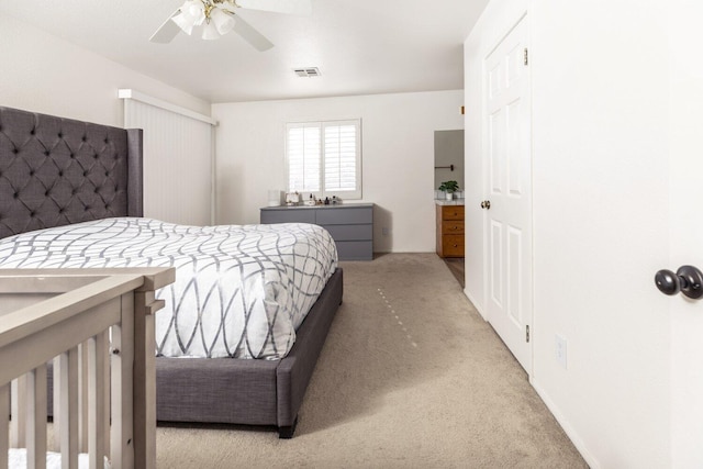 carpeted bedroom with ceiling fan