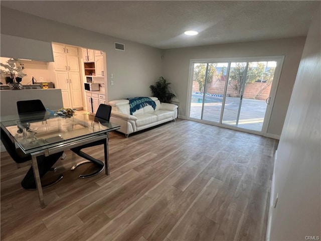 living room with hardwood / wood-style floors