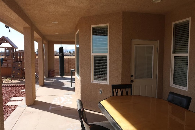 view of patio with fence