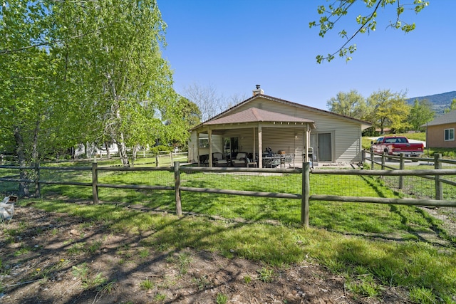 30140 Brassie Ct, Tehachapi, CA 93561 - rear view of property featuring a chimney