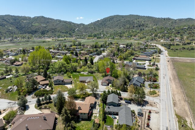 30140 Brassie Ct, Tehachapi, CA 93561 - aerial view of property's location featuring a mountain backdrop and nearby suburban area