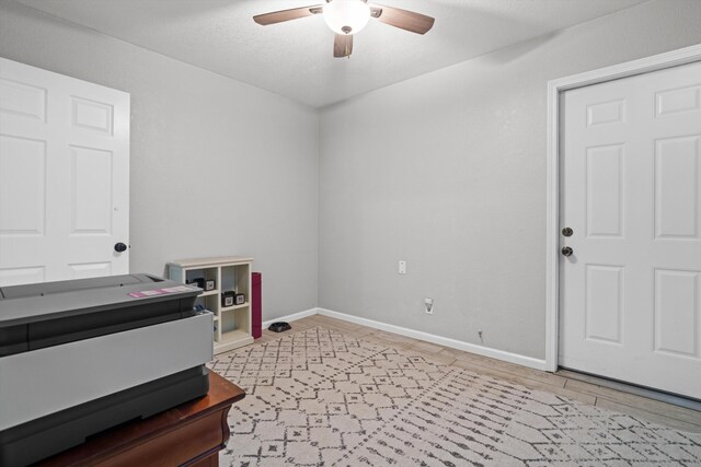 30140 Brassie Ct, Tehachapi, CA 93561 - miscellaneous room with a ceiling fan and baseboards