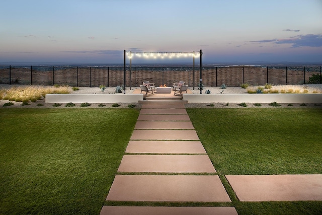 view of yard featuring a patio and fence